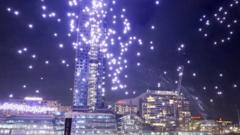 Source-feed image associated with Dozens of drones crash into Sydney harbour after light show glitch