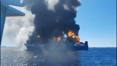 Image from linked report: Smoke rises from burning Greek cargo ship near Mykonos