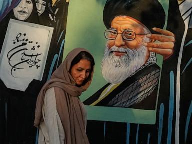 Source-feed image associated with Iran says it is suspending commitments to interim deal with US as the two exchange attacks