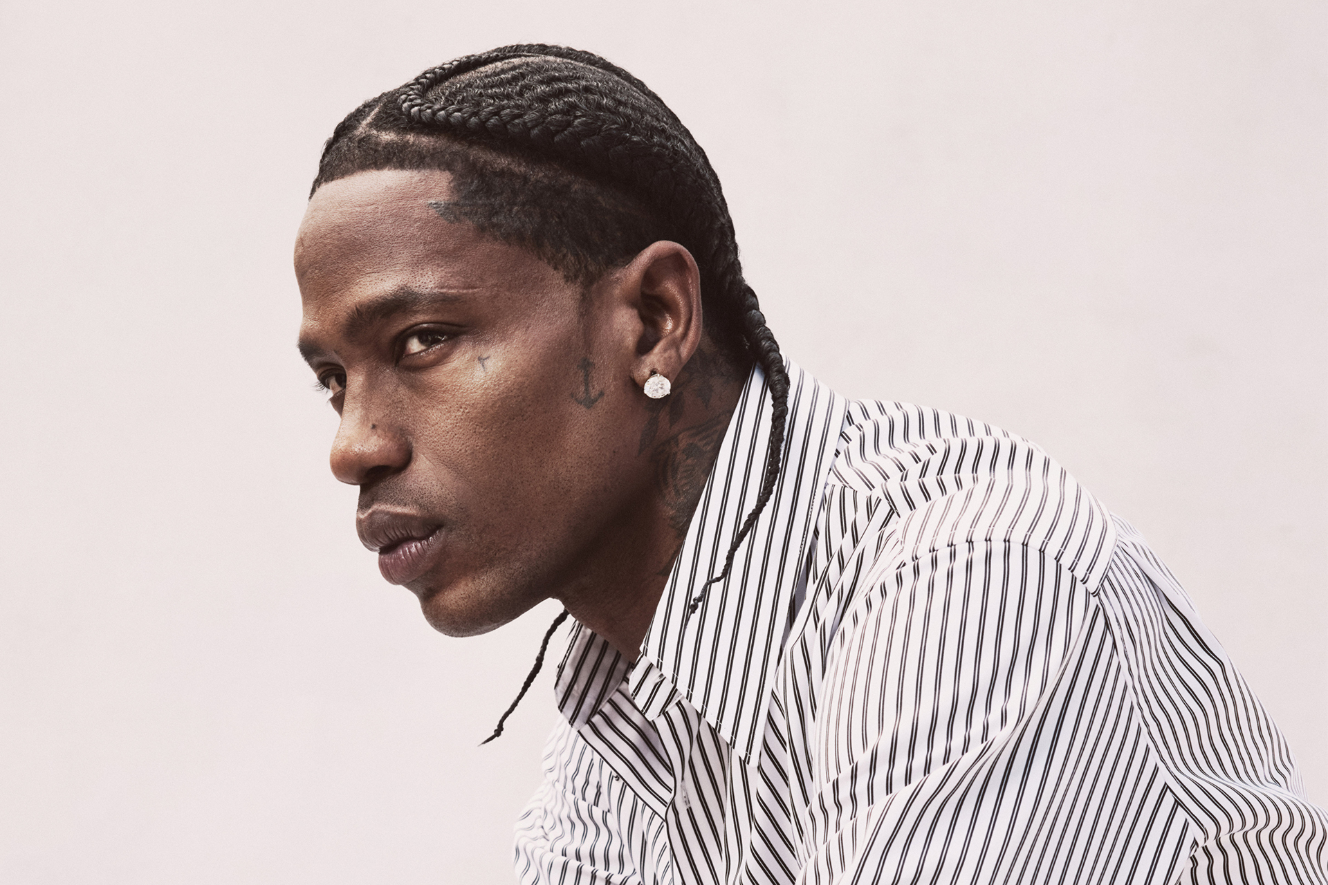 Source-feed image associated with LISTEN: How Travis Scott is Ascending to Culture Moguldom Through Music, Movies, Retail, Business and More