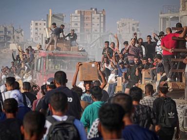 Source-feed image associated with UN food agency halves West Bank aid because of funding shortages, warns new cuts may be needed