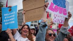 Source-feed image associated with Thousands gather for anti-racism rally in Belfast after disorder