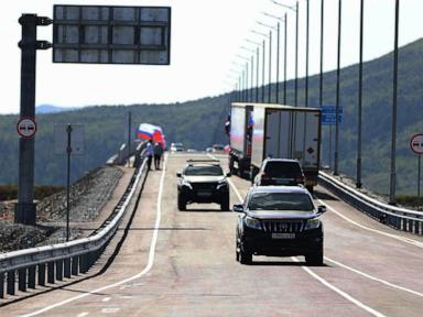Source-feed image associated with Russia and North Korea open the first road link across shared border