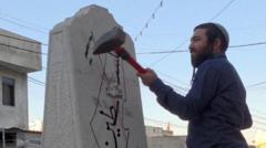 Source-feed image associated with Far-right Israeli lawmaker damages Palestinian memorial with sledgehammer