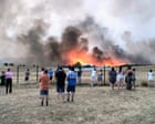 Source-feed image associated with France and Spain race to control wildfires as more than 250,000 evacuated – live