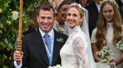 Source-feed image associated with King's nephew Peter Phillips weds NHS nurse with William and Kate among guests