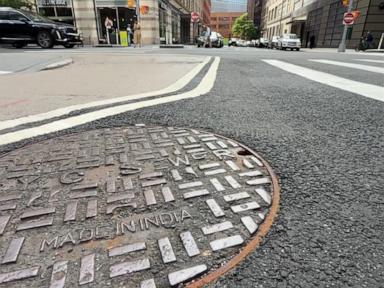 Source-feed image associated with WATCH: Police investigate mystery men emerging from manholes