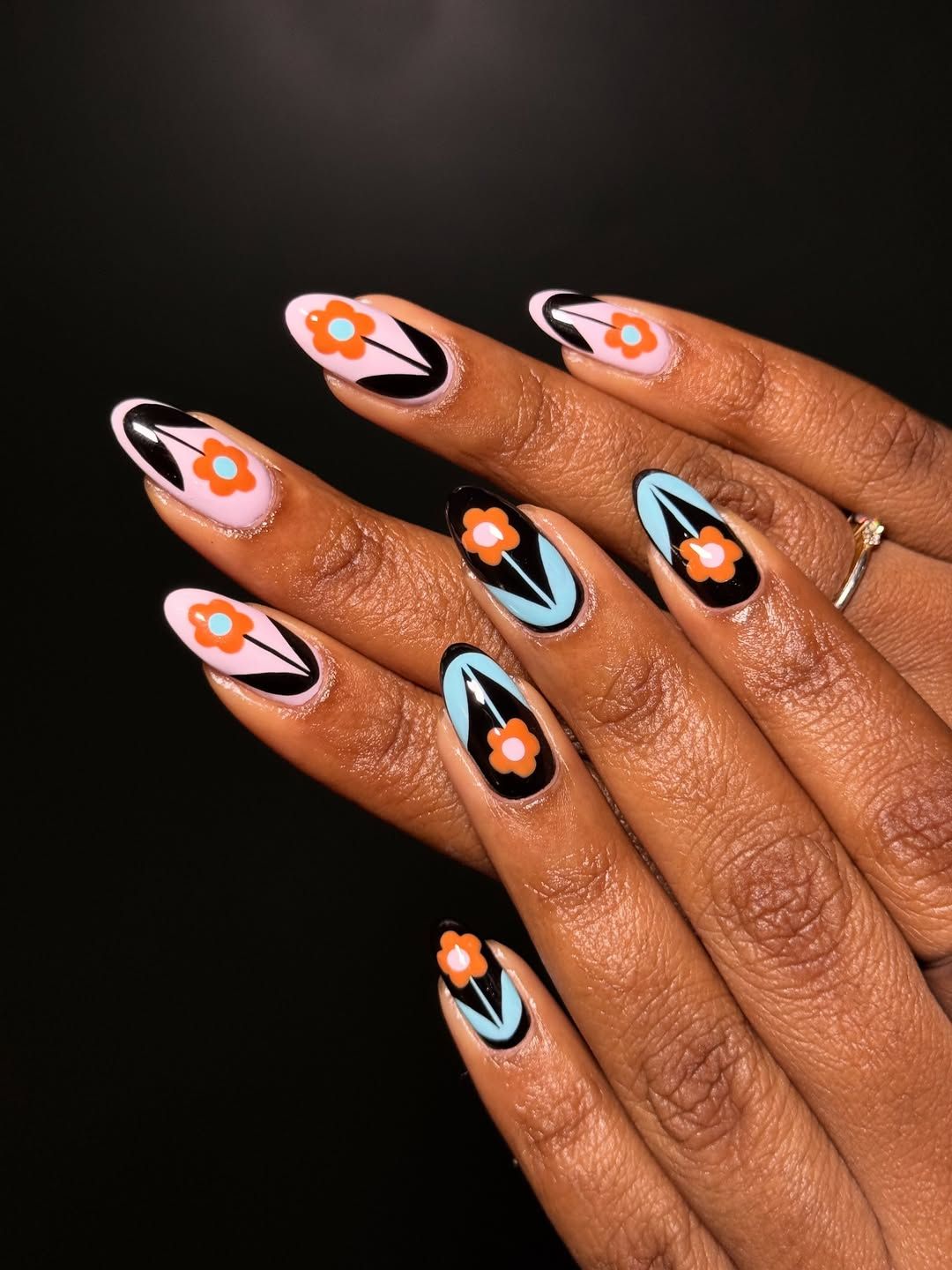 Source-feed image associated with 33 Actually Groundbreaking Flower Nail Designs to Wear Right Now