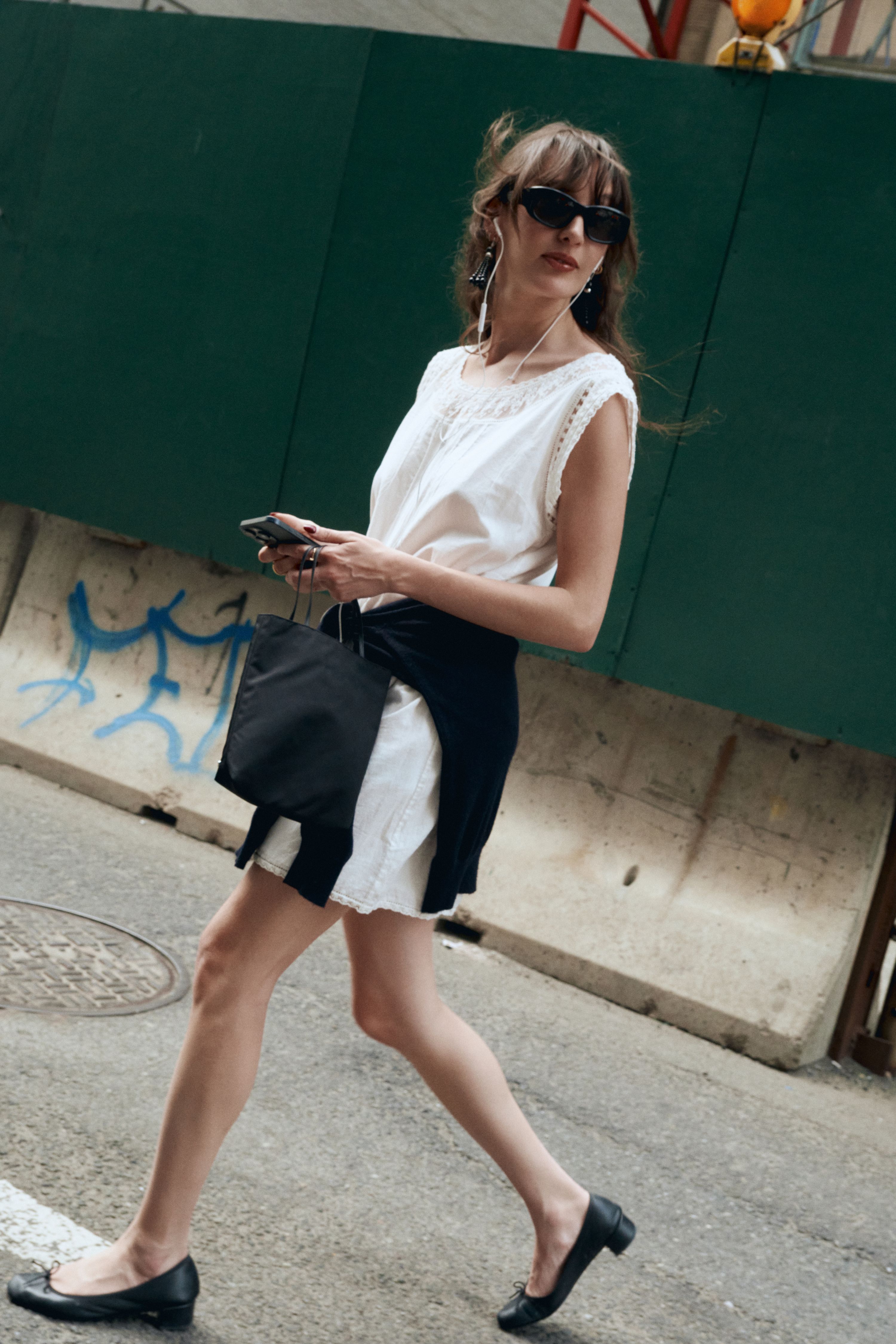 Source-feed image associated with The Best Summer Sweaters, According to Vogue Staffers