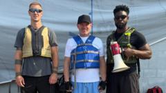 Source-feed image associated with Rooney, Hart and Richards row down Hudson River