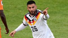 Source-feed image associated with From factory floor to World Cup star - Germany's super-sub Undav