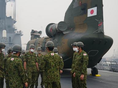 Source-feed image associated with Japan deploys equipment to Borneo to help fight wildfires causing toxic haze