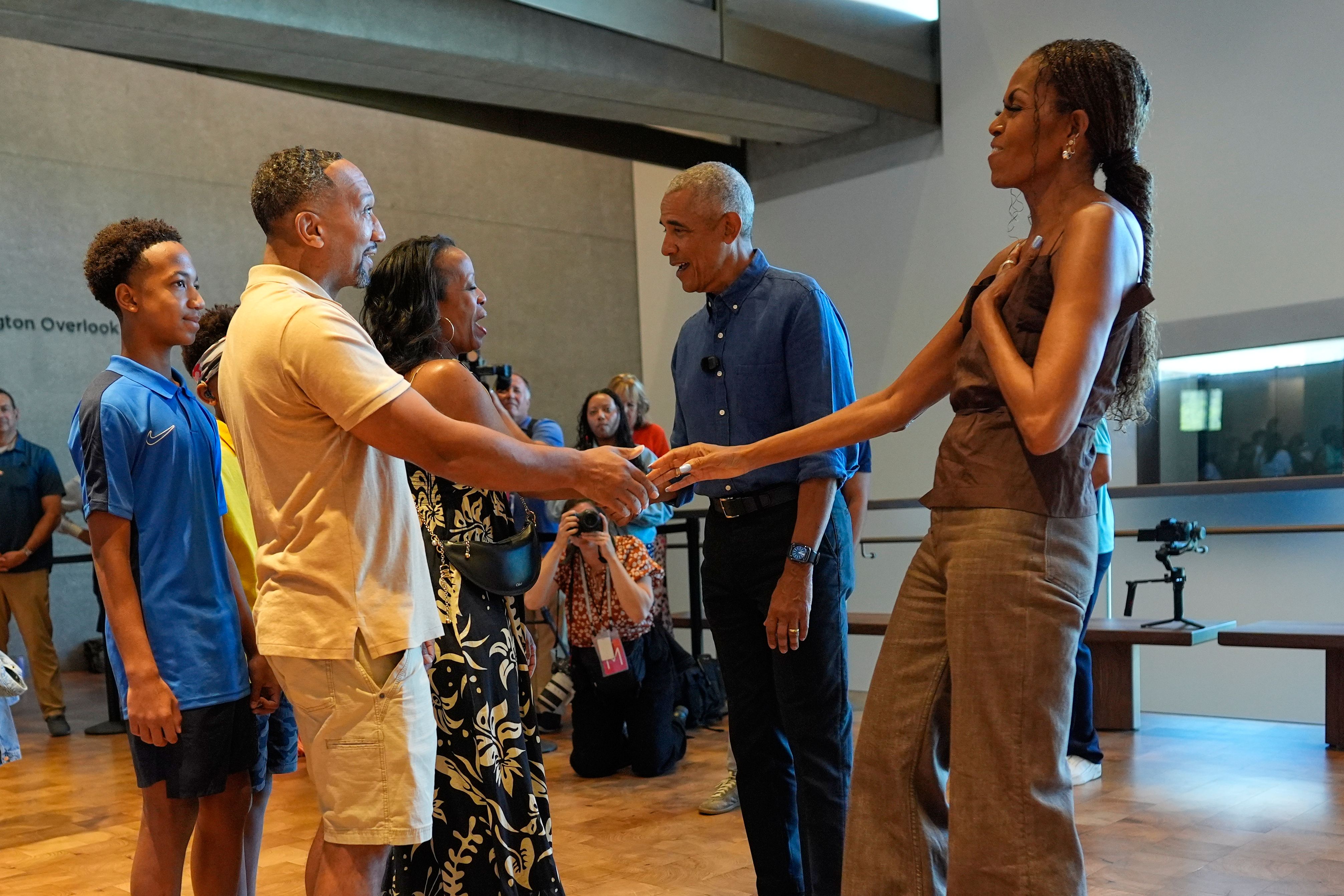 Source-feed image associated with Michelle Obama Embraces a Classic: Jeans and a Nice Top