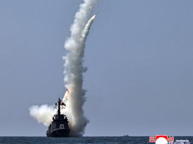 Source-feed image associated with North Korean leader Kim observes weapons tests from new naval destroyer