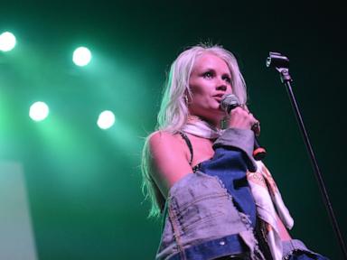 Source-feed image associated with G.R.L. member and 'Party Rock Anthem' singer Lauren Bennett dies at 37