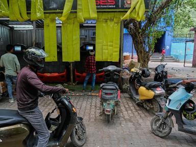 Source-feed image associated with India's capital part of aggressive electric vehicle targets in bid to curb air pollution