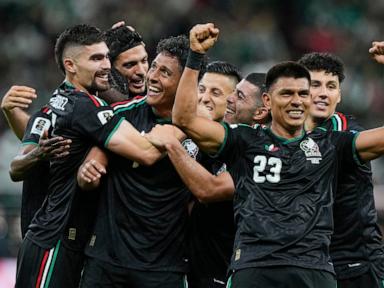 Source-feed image associated with Mexico becomes first country to reach knockout stage of World Cup
