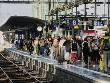 Source-feed image associated with German railway says outage that halted all trains was caused by scheduled work
