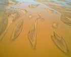 Source-feed image associated with Sand overextraction weakening riverbanks as concrete demand soars