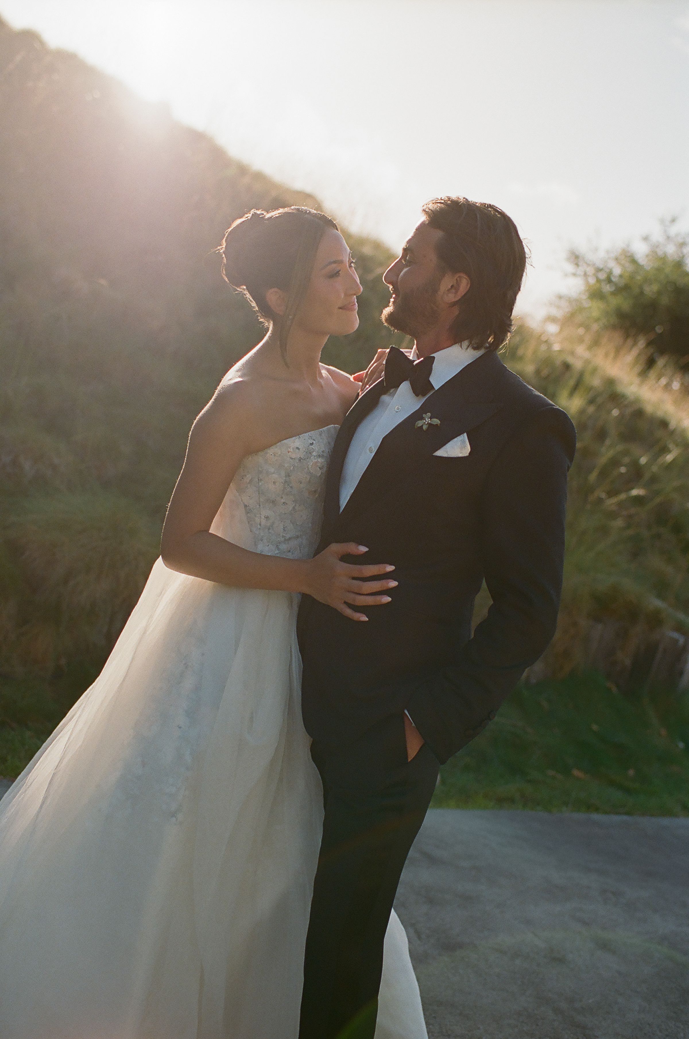 Source-feed image associated with This Artist Bride’s Hand-Painted Danielle Frankel Dress Shaped the Aesthetic of Her Carmel Valley Wedding