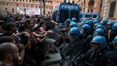 Source-feed image associated with Dozens hurt in Bologna protests after man dies while being restrained by police