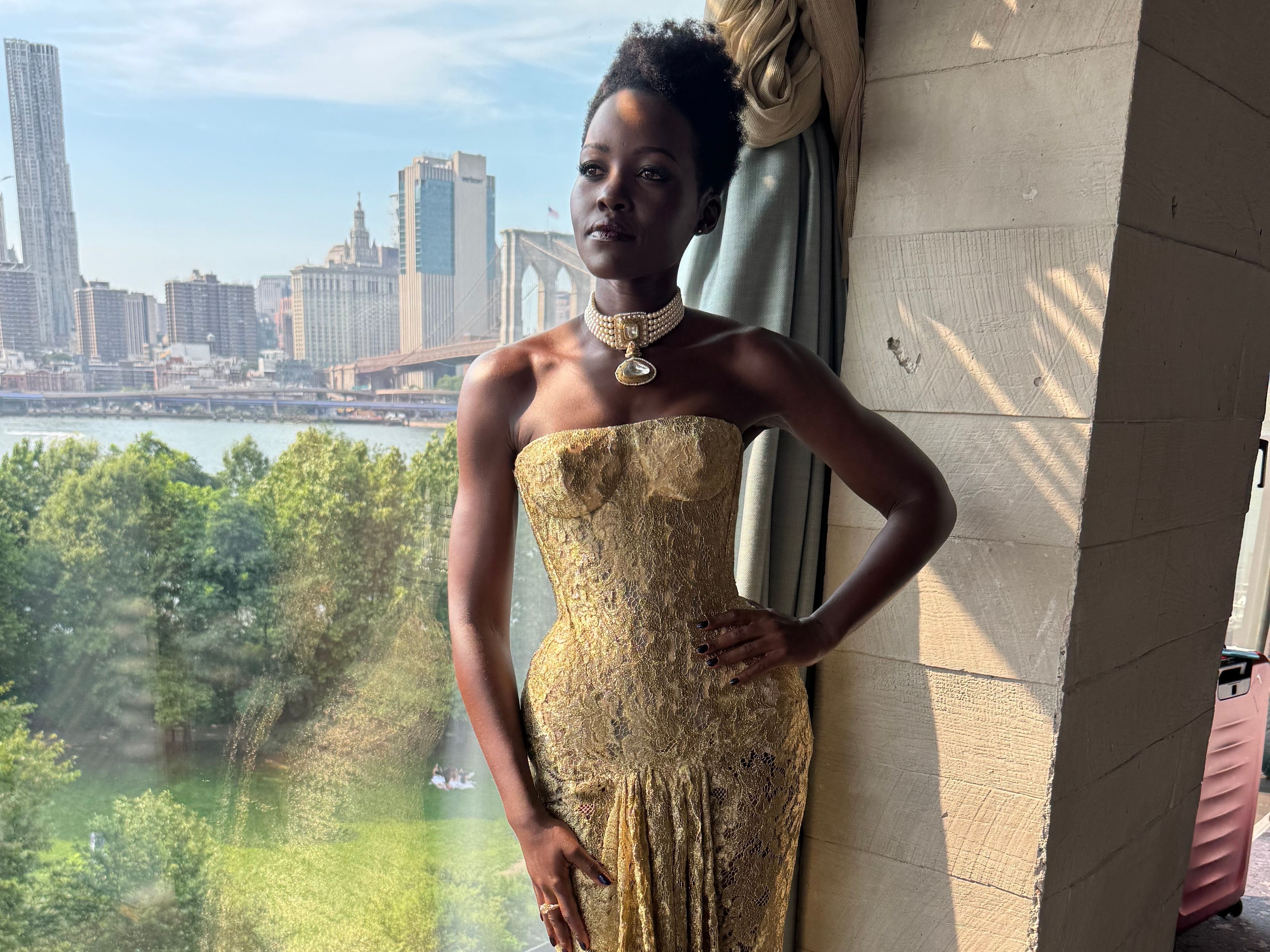 Source-feed image associated with For Lupita Nyong’o’s The Odyssey Tour, It’s Queen-Worthy Fashions Only