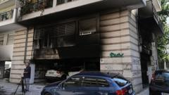 Source-feed image associated with Greek politician's mother dies of wounds after arson attack