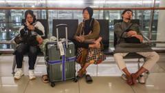 Source-feed image associated with Volcano eruption triggers flight suspensions at Indonesia's main airport