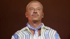 Source-feed image associated with Macklemore says 'Free Palestine' call was not an attack on Jewish people