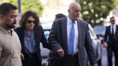 Source-feed image associated with Erika Kirk comes face-to-face in court with husband's alleged killer