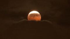 Source-feed image associated with Watch: Stargazers around the world glimpse 'Blood Moon' lunar eclipse