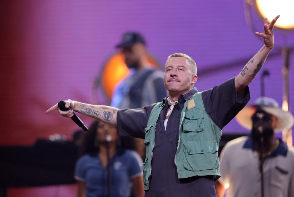 Source-feed image associated with The growing fallout over Macklemore's exit from Ed Sheeran's tour