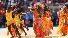 Source-feed image associated with Shakira, Madonna, Justin Bieber and BTS perform at colourful World Cup half-time show
