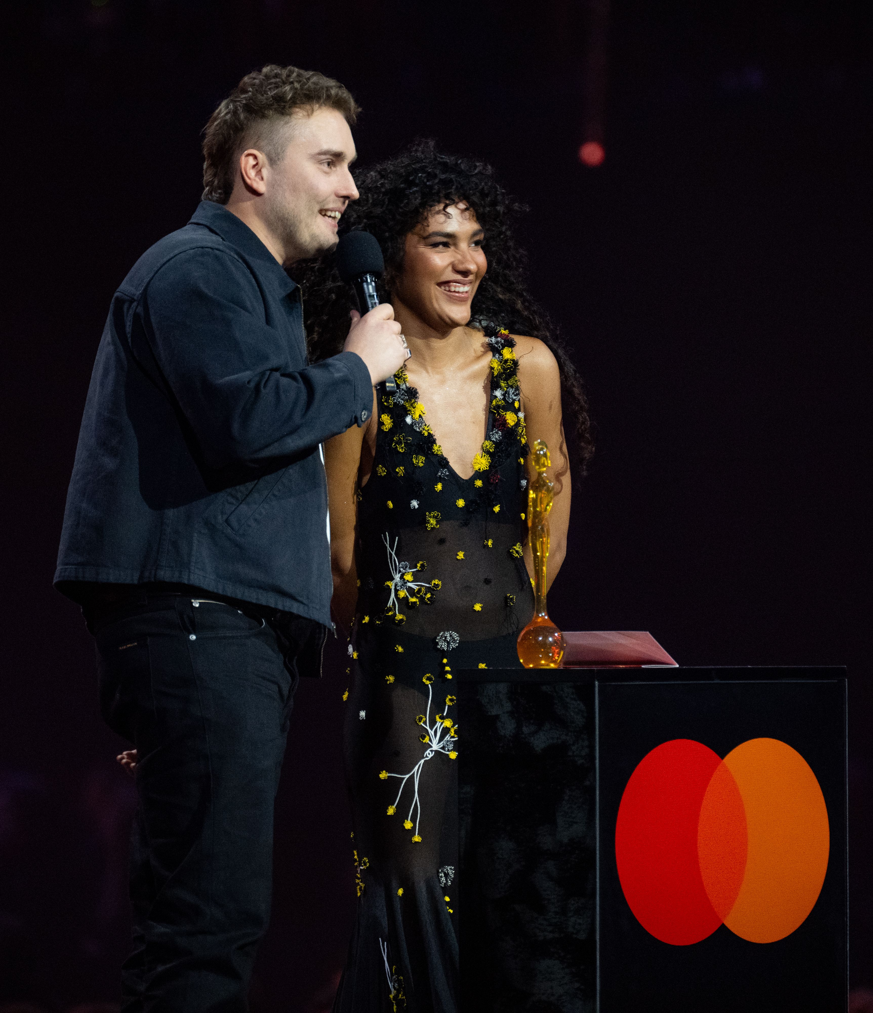 Source-feed image associated with Sam Fender and Olivia Dean’s “Rein Me In” Is Longest-Running No. 1 Single Ever in UK