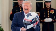 Source-feed image associated with Trump watches IndyCar pit stop outside White House