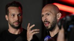 Source-feed image associated with Tate brothers to remain in US jail as they fight extradition to UK