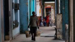 Source-feed image associated with Cubans protest after third nationwide power cut this year