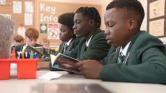 Source-feed image associated with England up in reading, maths and science rankings as Scotland and Wales fall behind