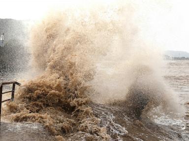 Source-feed image associated with Typhoon Bavi brings strong winds and rain to eastern China as more than 2 million people evacuated
