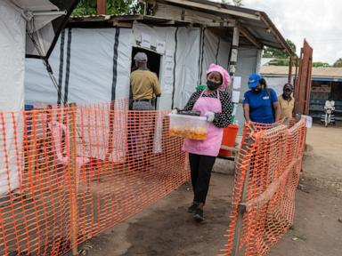 Source-feed image associated with As Congo grapples with Ebola, volunteers cook meals to support patients