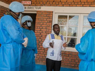Source-feed image associated with Health workers at the epicenter of Congo's Ebola outbreak labor with little pay or rest