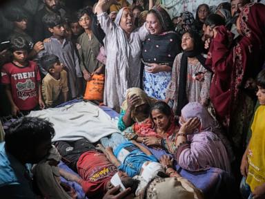 Source-feed image associated with Roof of tutoring center collapses in eastern Pakistan, killing at least 14 children, police say