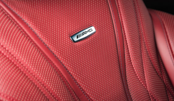 Source-feed image associated with Drivers of Mercedes AMG Cars File Class Action Over Burn Hazard From Logo on Seat