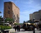 Source-feed image associated with Venezuelans newly deported from US missing after hotel collapse
