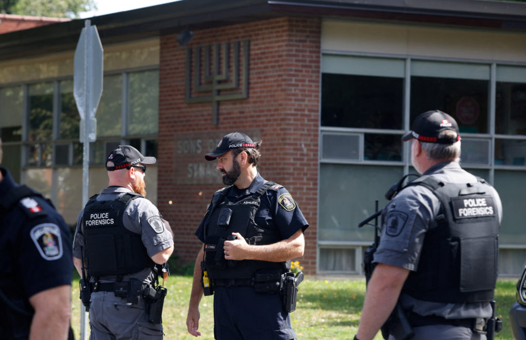 Image from linked report: Up to 30 shots fired after man opened fire on officer outside Ontario synagogue