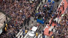 Source-feed image associated with 'City united after so long': New Yorkers rejoice in Knicks' championship parade