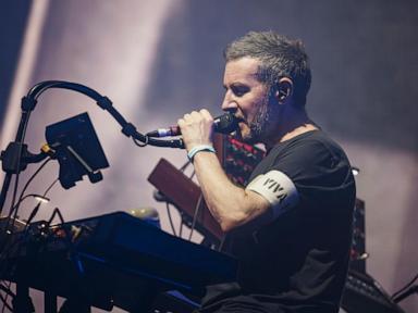 Source-feed image associated with Singapore bans 2 Massive Attack members after pro-Palestine display at concert