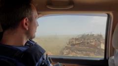 Source-feed image associated with BBC sees destroyed villages in Israeli-occupied southern Lebanon