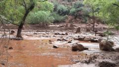 Source-feed image associated with One still missing after Grand Canyon floods kill two and prompts rescue efforts