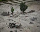 Source-feed image associated with Nepal-Tibet flood deaths pass 1,000 as police ask relatives for DNA to identify victims